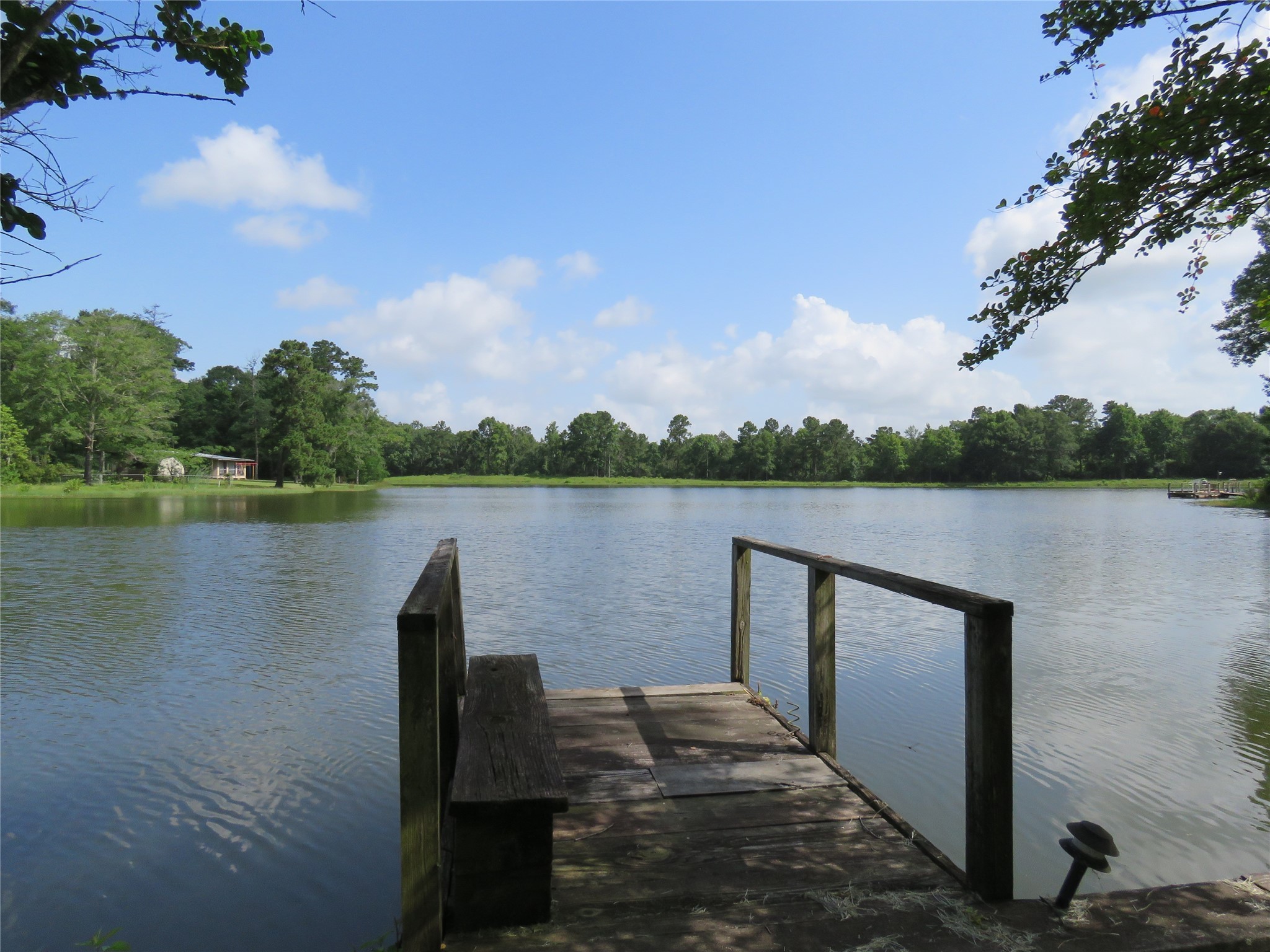15255 Austin Road Willis, TX 77378 - Photo 1 of 25 a lake view with a lake view