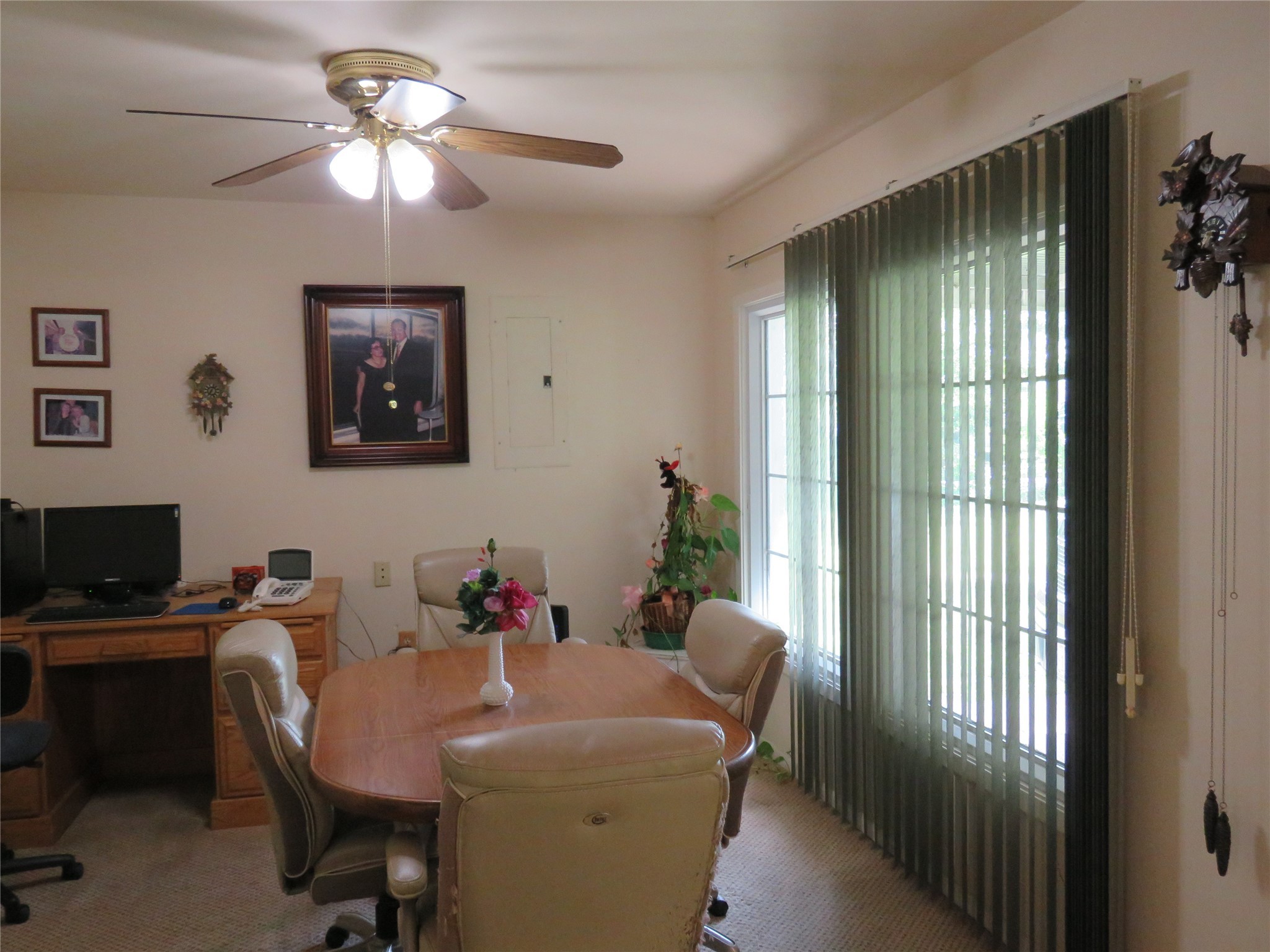 15255 Austin Road Willis, TX 77378 - Photo 15 of 25 a view of a workspace with furniture and a window