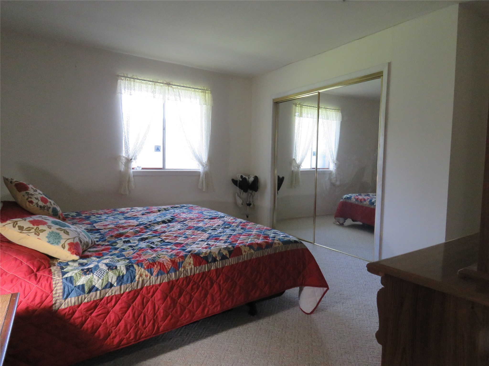 15255 Austin Road Willis, TX 77378 - Photo 16 of 25 a bedroom with a bed and a window