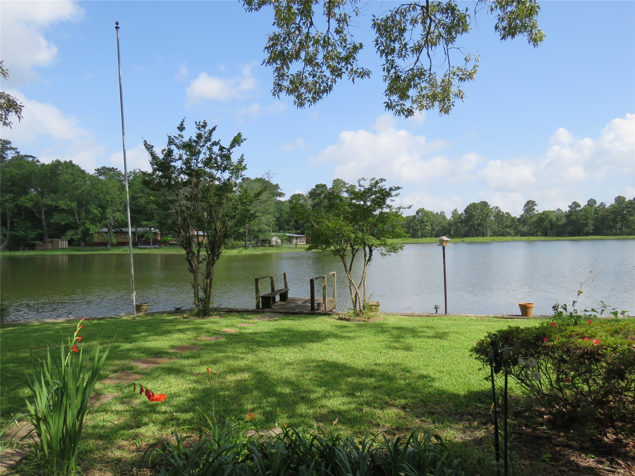 15255 Austin Road Willis, TX 77378 - Photo 3 of 25 a view of a lake
