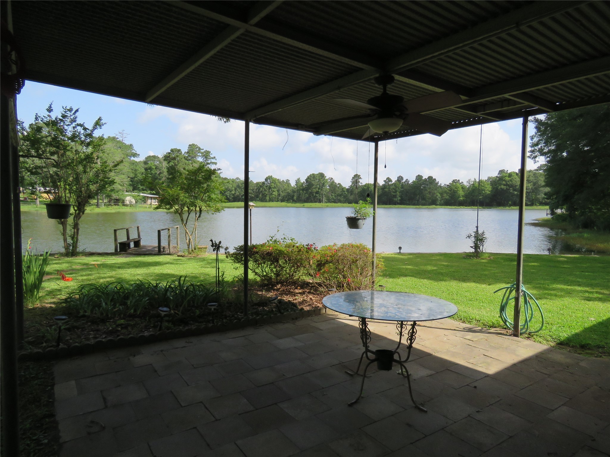 15255 Austin Road Willis, TX 77378 - Photo 4 of 25 a view of a garden with a slide