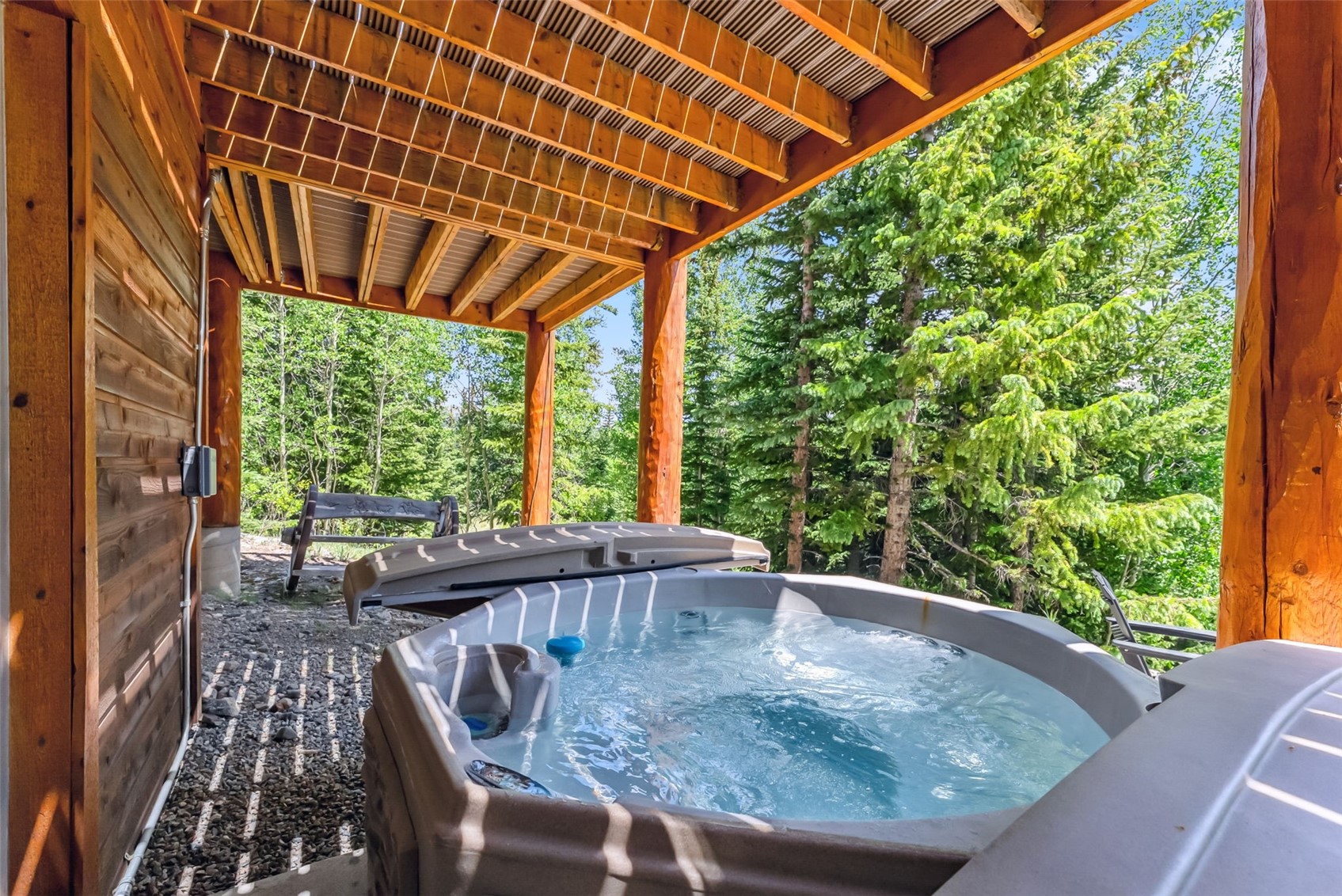 1375 Roberts Road Alma, CO 80420 - Photo 36 of 50 View of patio / terrace featuring a hot tub