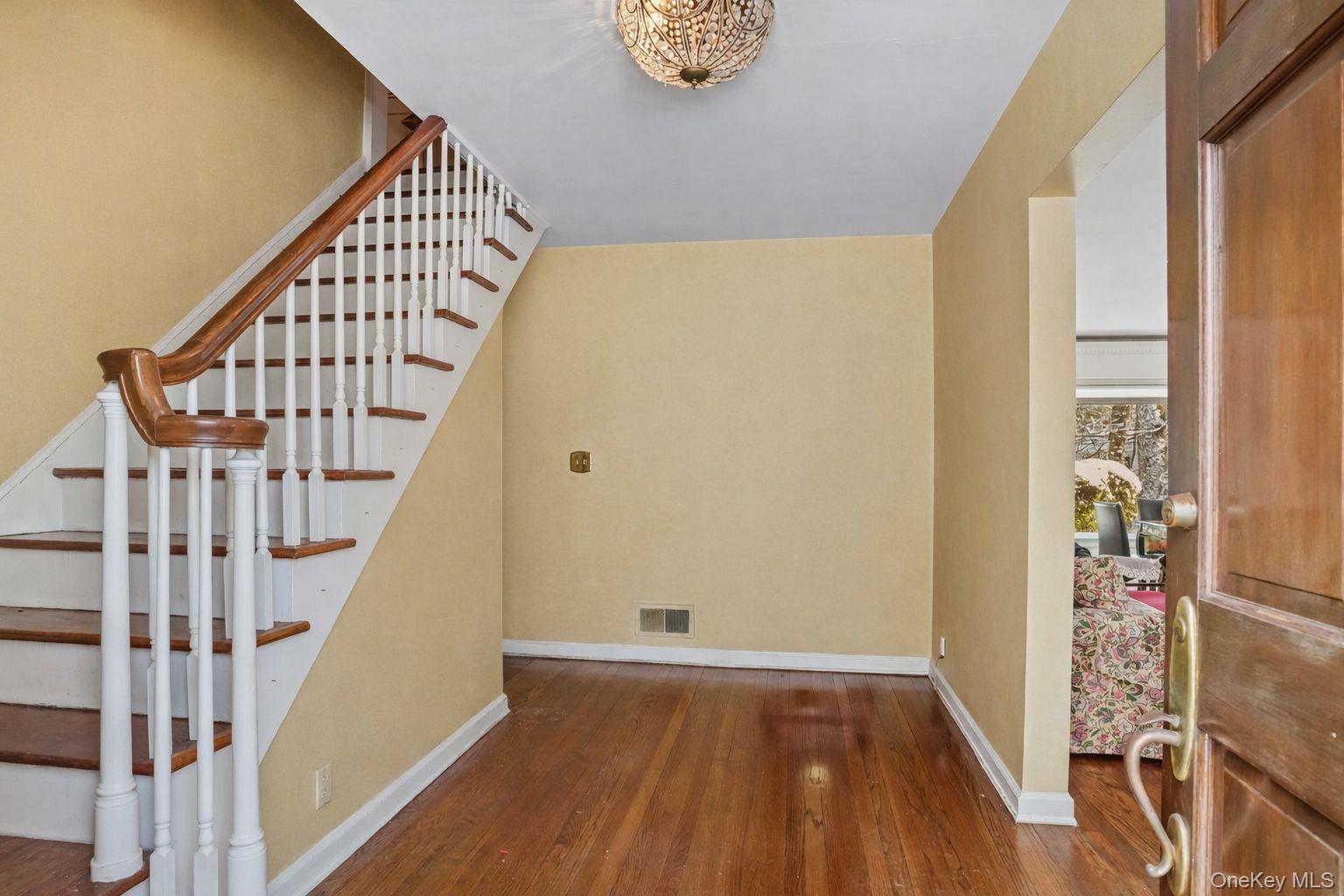 1 Village Lane Bronxville, NY 10708 - Photo 3 of 16 a view of entryway with wooden floor