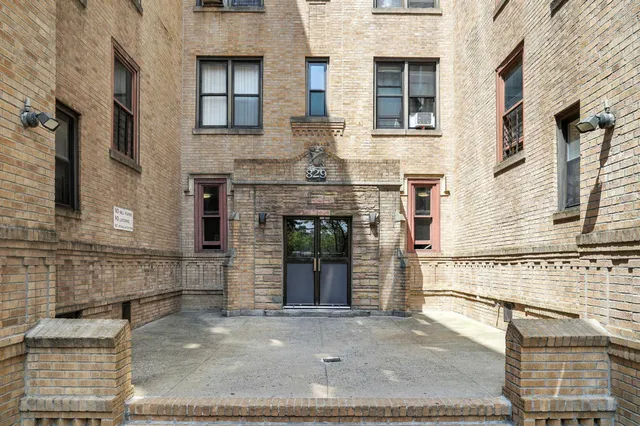 a front view of a house with a garage
