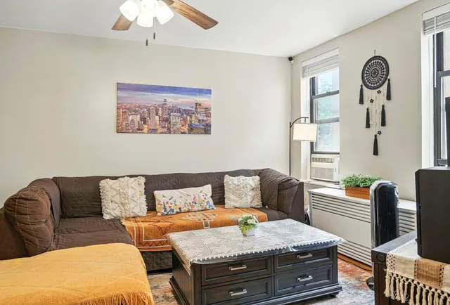 a living room with furniture and a couch