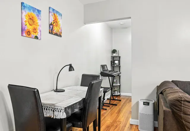 a view of a workspace with furniture