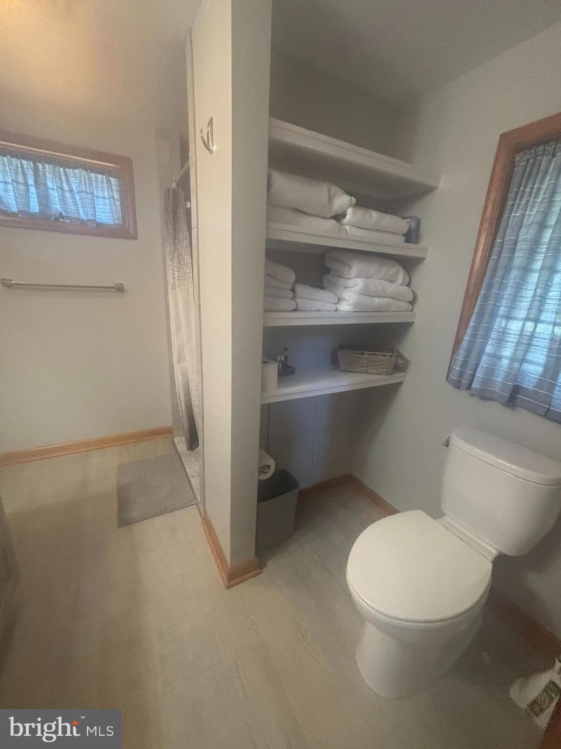 379 River Road, Unit A Elkton, MD 21921 - Photo 11 of 20 a white toilet sitting next to a window