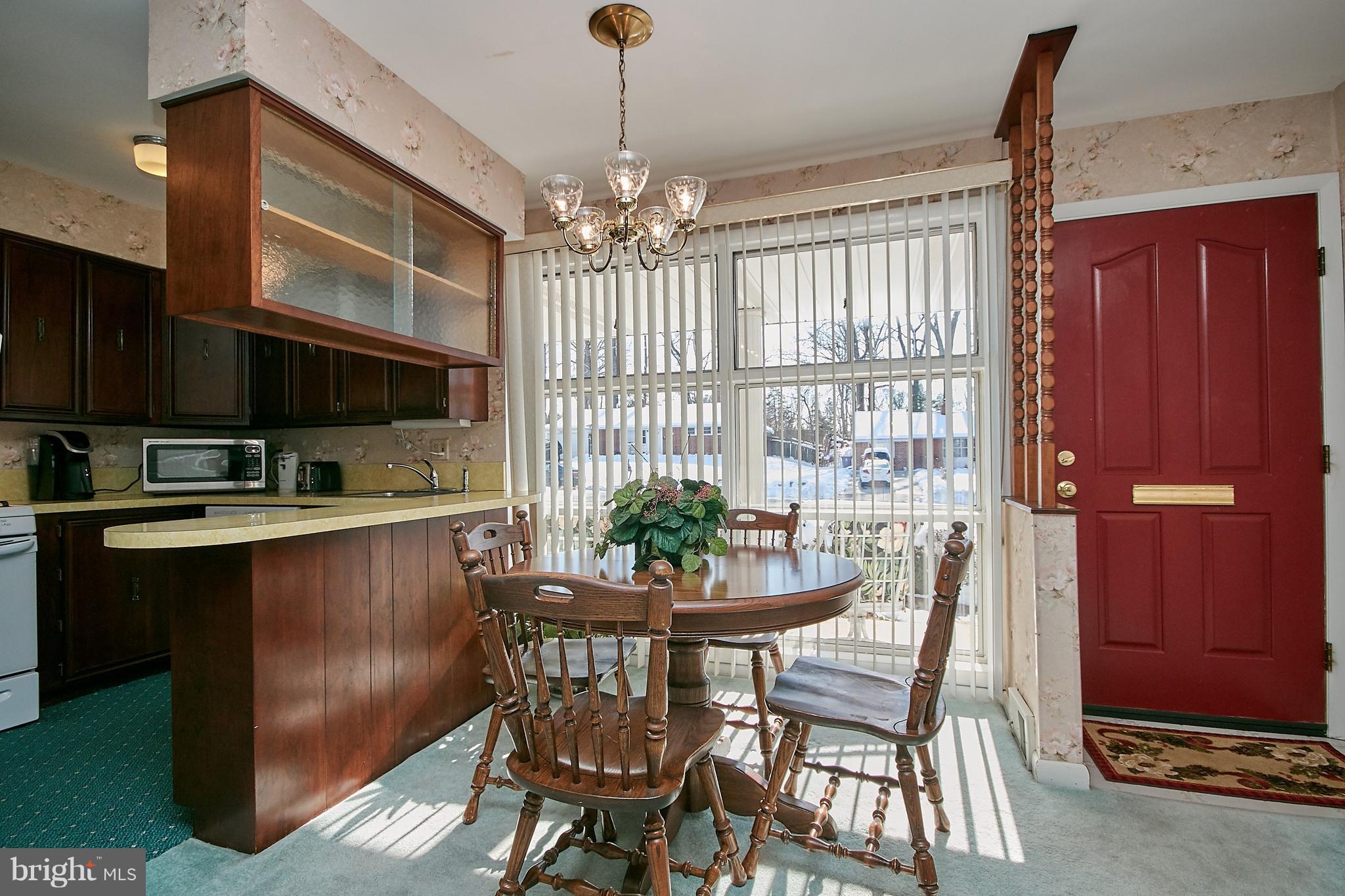7311 Floyd Avenue Springfield, VA 22150 - Photo 13 of 33 Dining Room with Floor to Ceiling Windows
