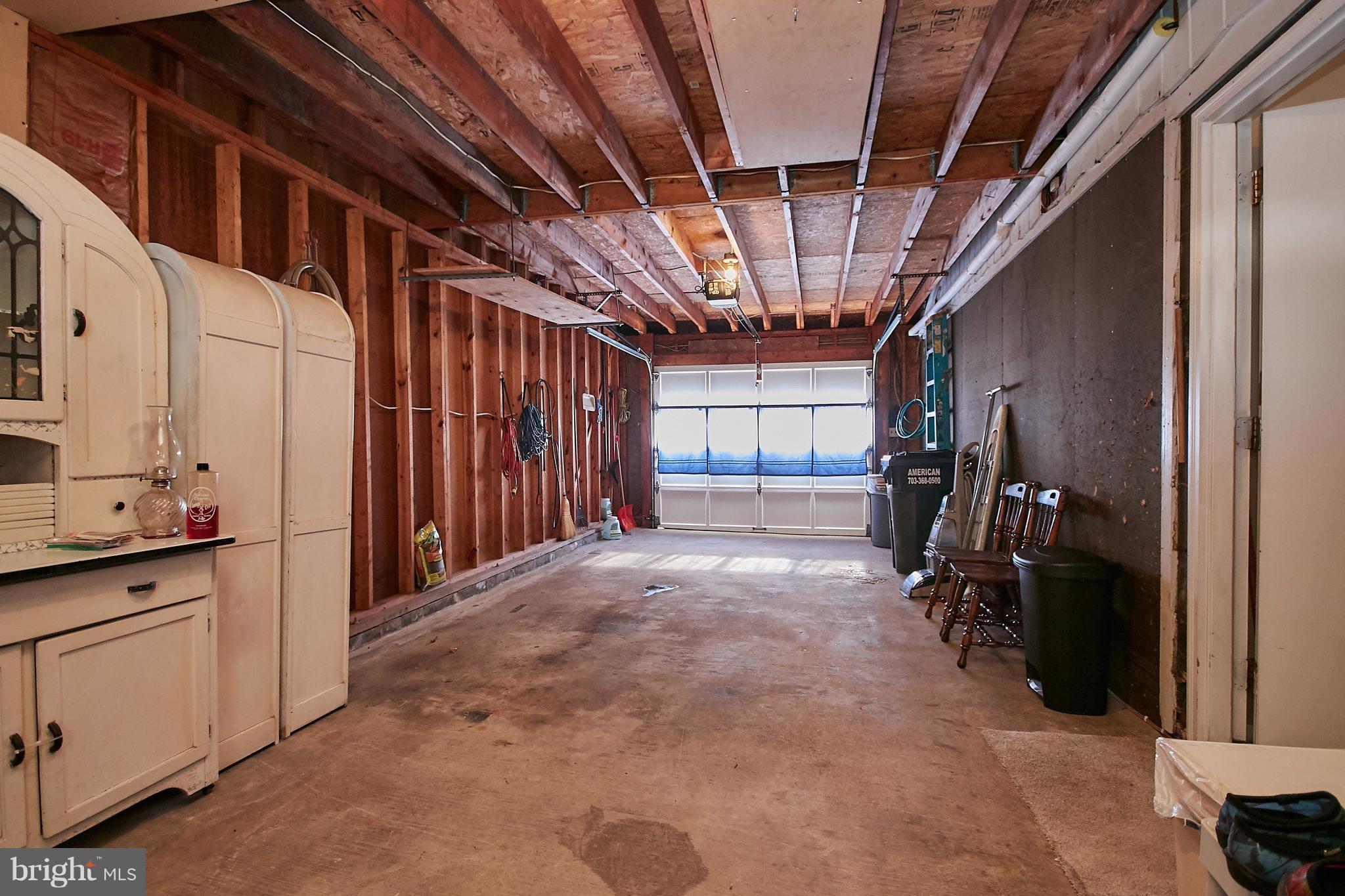 7311 Floyd Avenue Springfield, VA 22150 - Photo 26 of 33 Oversized Garage with Pull Down Stairs
