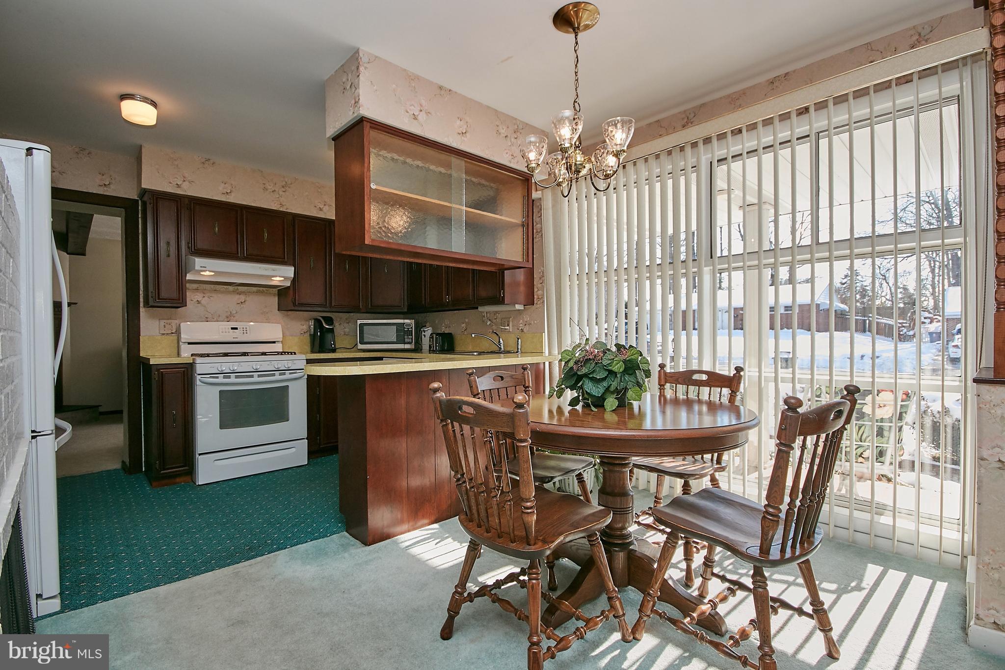 7311 Floyd Avenue Springfield, VA 22150 - Photo 8 of 33 Dining Room with 2 Sided Fireplace