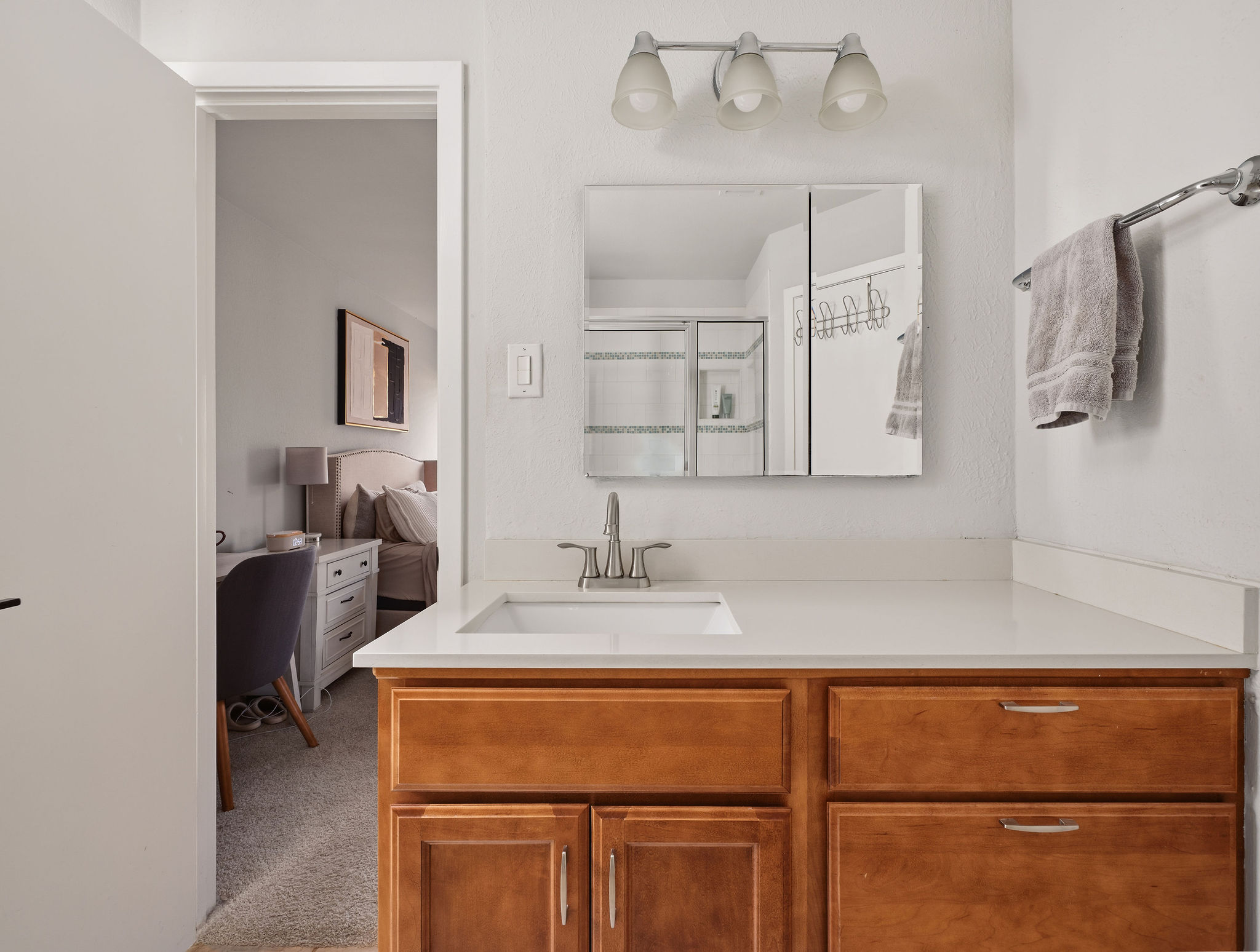 2008 Lear Lane Austin, TX 78745 - Photo 23 of 32 a bathroom with a sink and a mirror