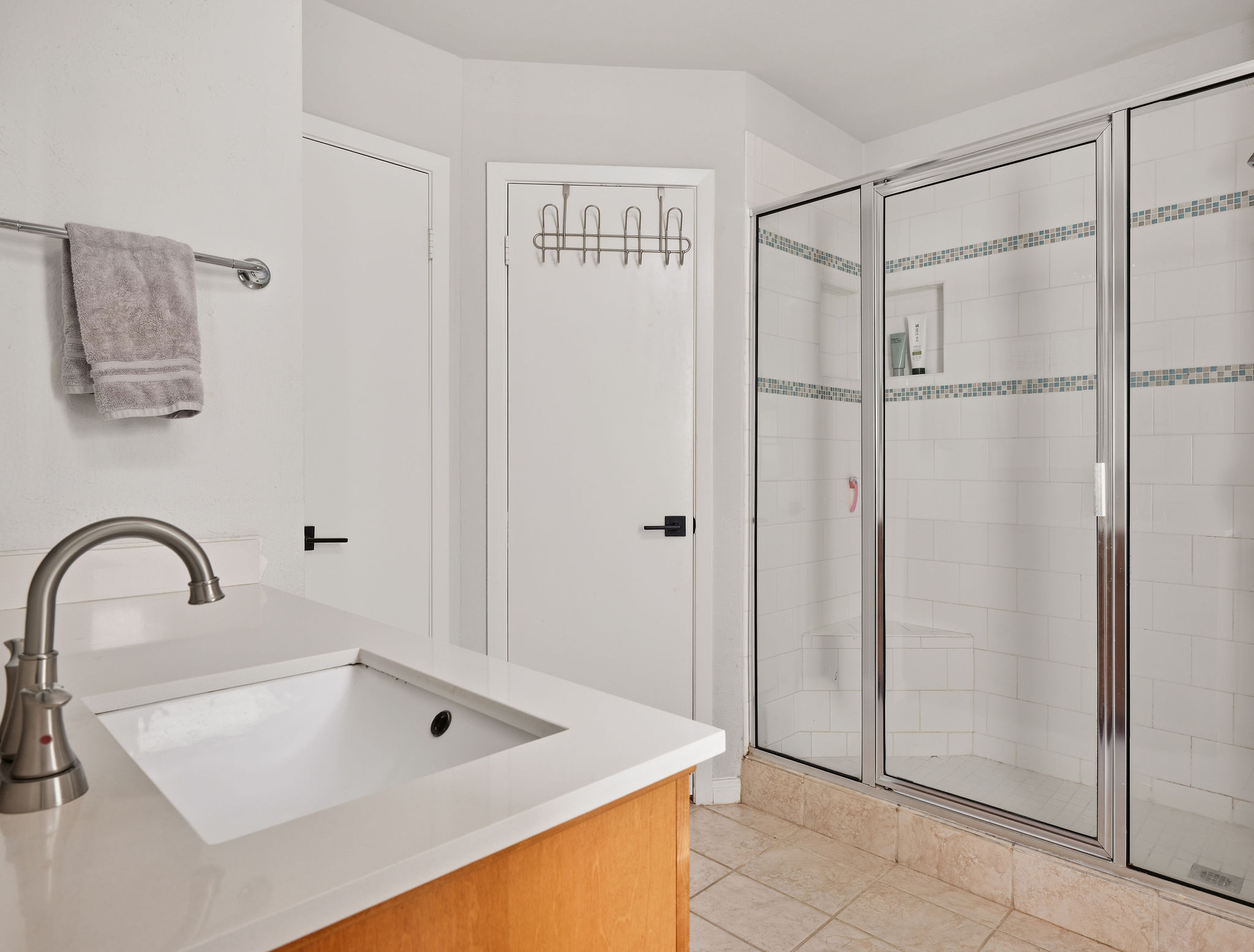 2008 Lear Lane Austin, TX 78745 - Photo 24 of 32 a bathroom with a bathtub and a sink