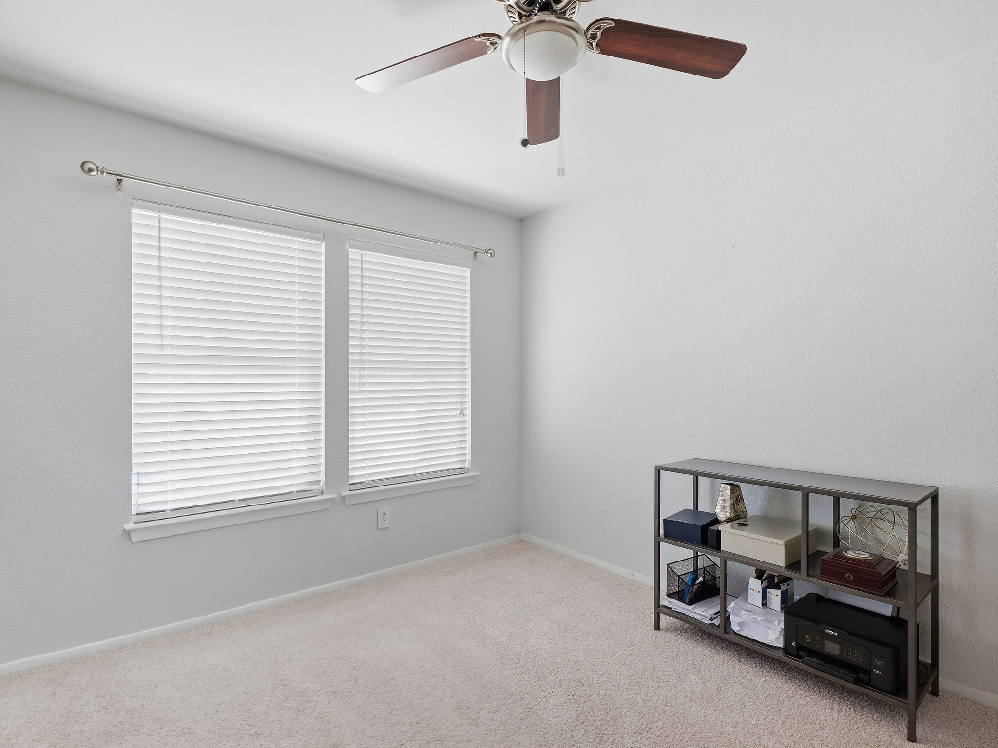2008 Lear Lane Austin, TX 78745 - Photo 28 of 32 a room with window and a ceiling fan