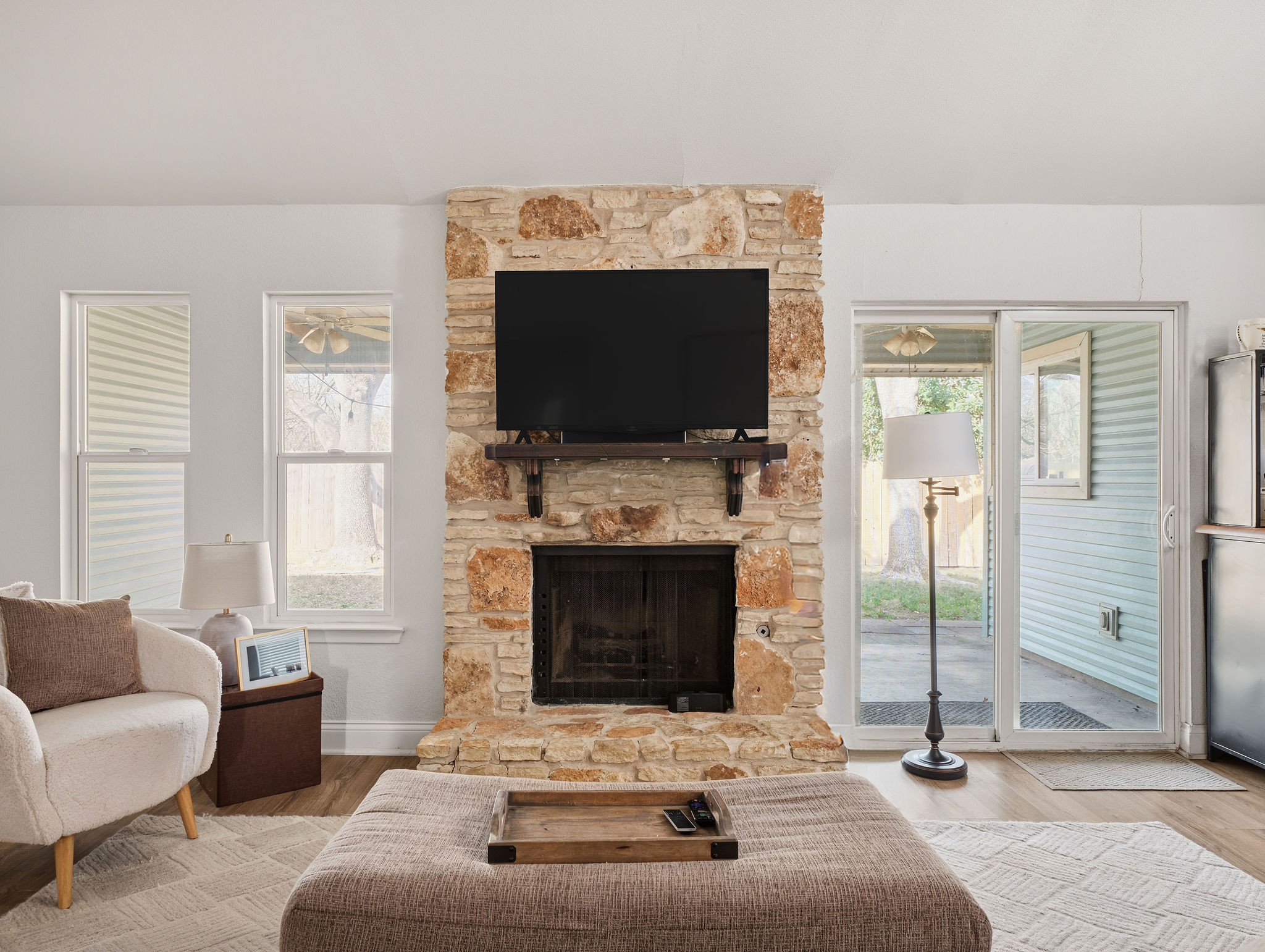 2008 Lear Lane Austin, TX 78745 - Photo 4 of 32 a living room with fireplace furniture and a flat screen tv