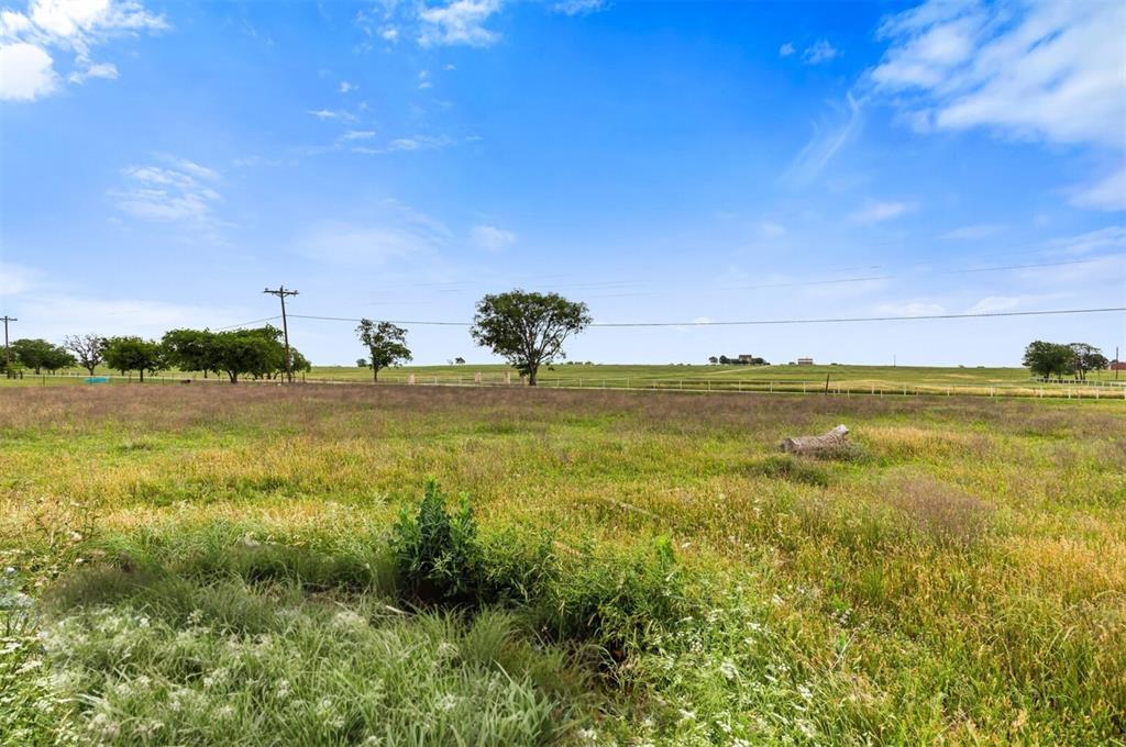 729 Twin Bends Road Crawford, TX 76638 - Photo 2 of 3 View of yard featuring a view of countryside