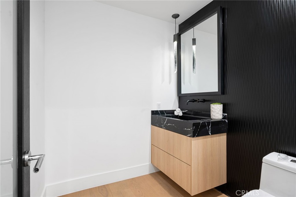 4731 Caritina Drive Tarzana, CA 91356 - Photo 12 of 42 a bathroom with a sink and a toilet