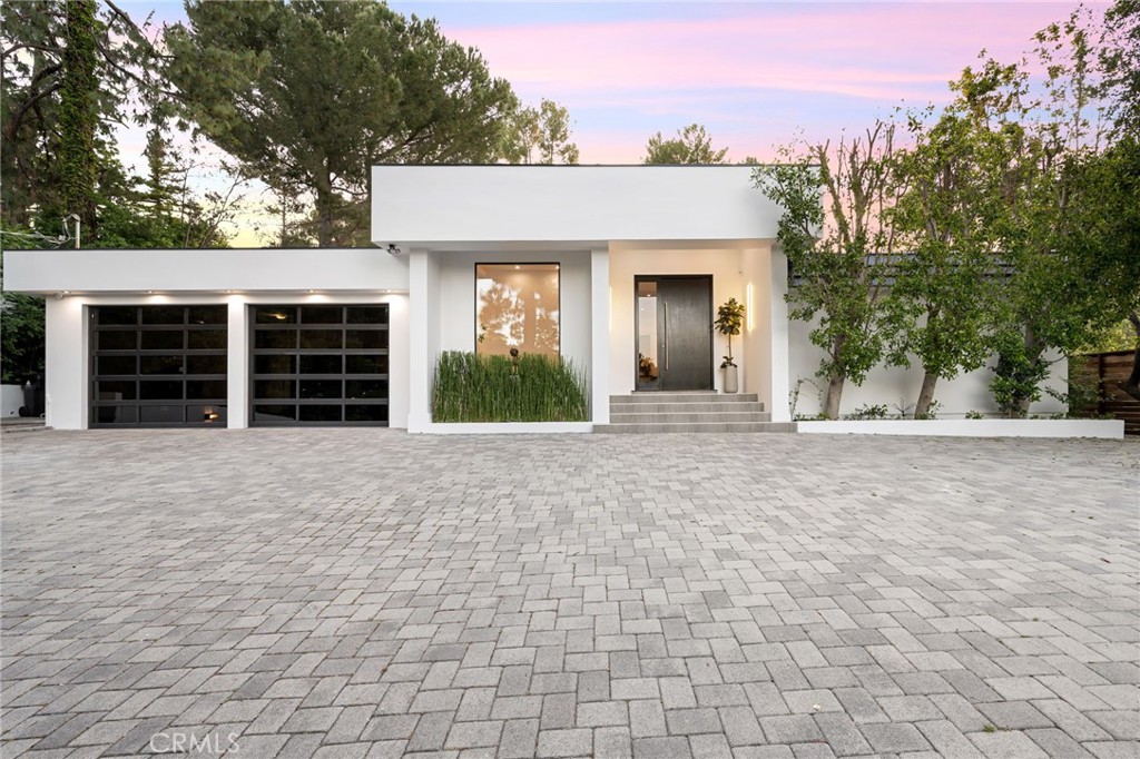 4731 Caritina Drive Tarzana, CA 91356 - Photo 2 of 42 front view of a house with a yard