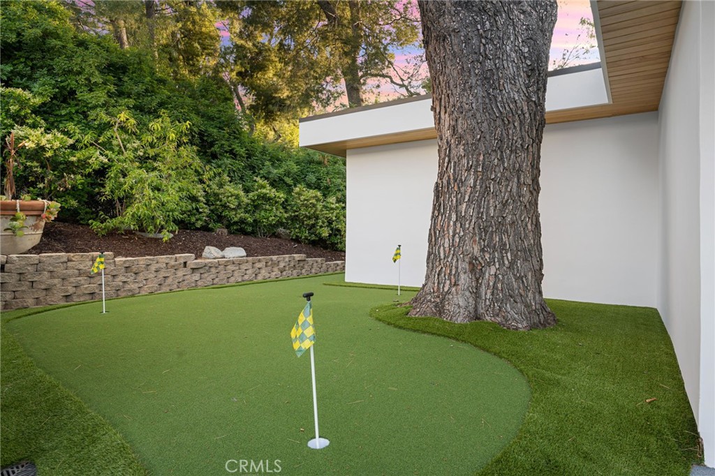 4731 Caritina Drive Tarzana, CA 91356 - Photo 28 of 42 a view of a tiny house with a yard