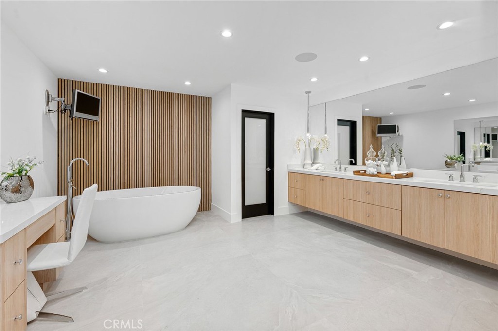 4731 Caritina Drive Tarzana, CA 91356 - Photo 33 of 42 a large room with a large window and stainless steel appliances