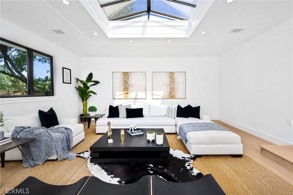 4731 Caritina Drive Tarzana, CA 91356 - Photo 5 of 42 a living room with furniture and a window