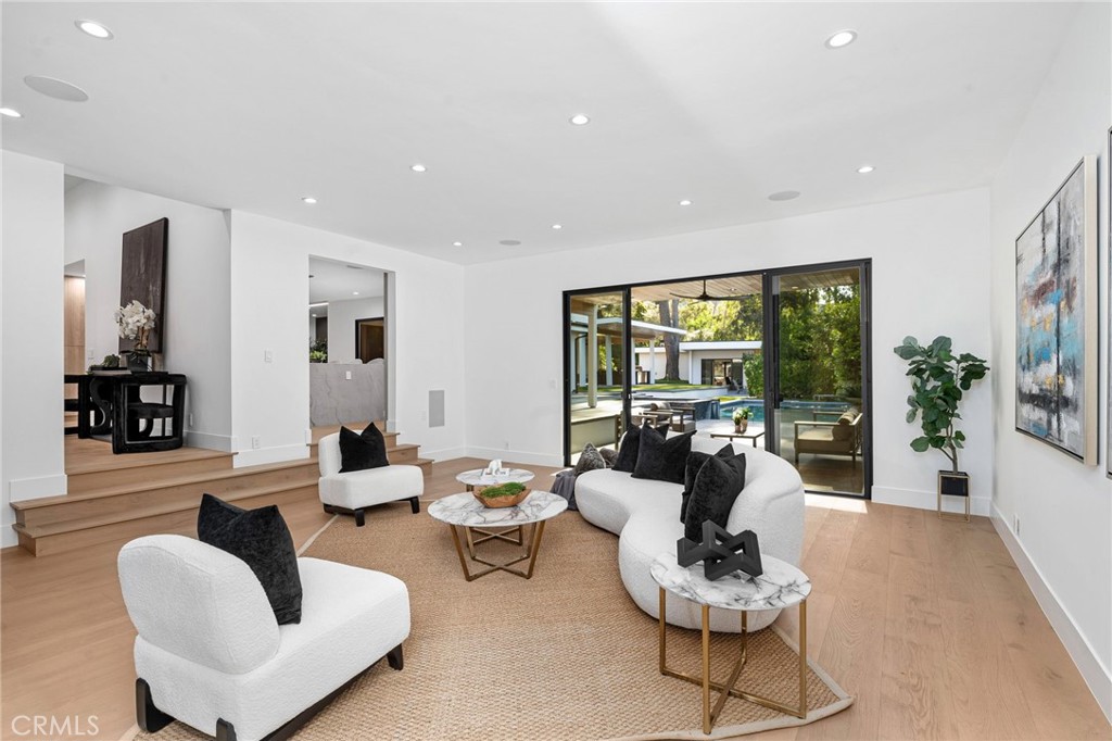 4731 Caritina Drive Tarzana, CA 91356 - Photo 7 of 42 a living room with furniture and a large window