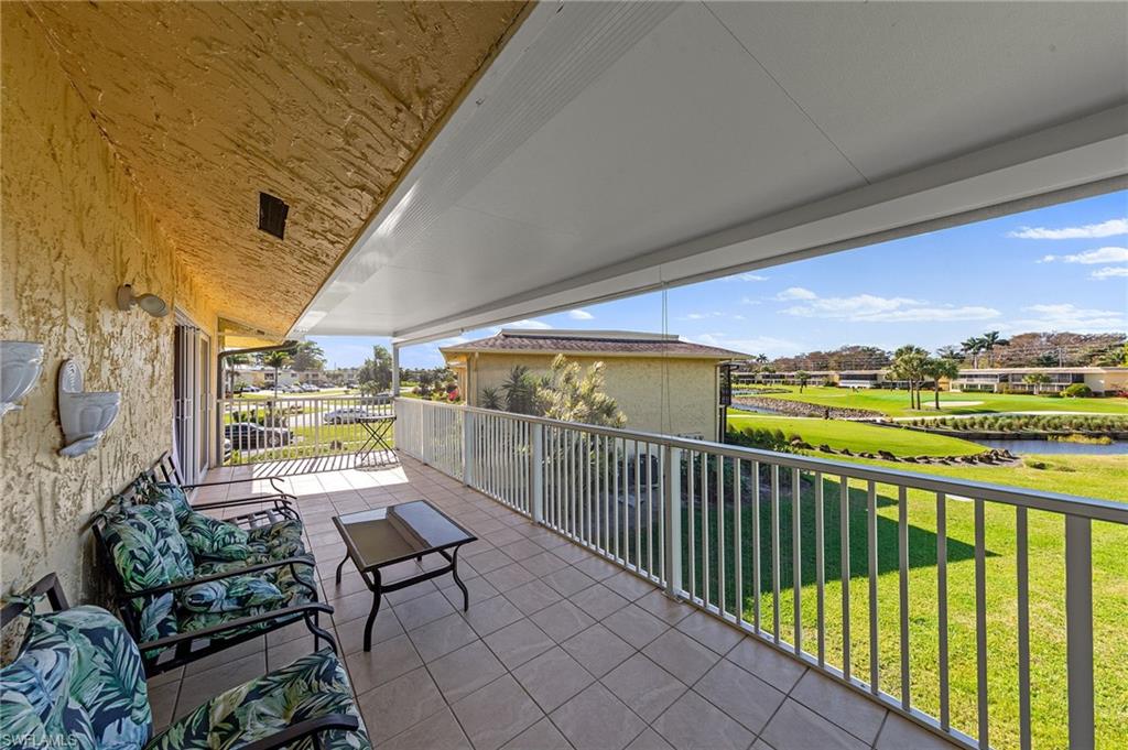 378 Palm Drive, Unit 4 Naples, FL 34112 - Photo 30 of 50 Large Screened Lanai