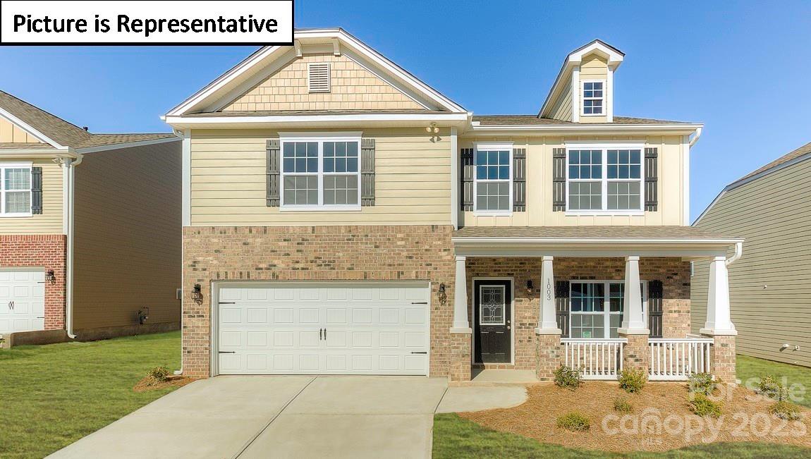 1200 Secrest Cmns Drive Monroe, NC 28112 - Photo 1 of 37 front view of a house with a yard