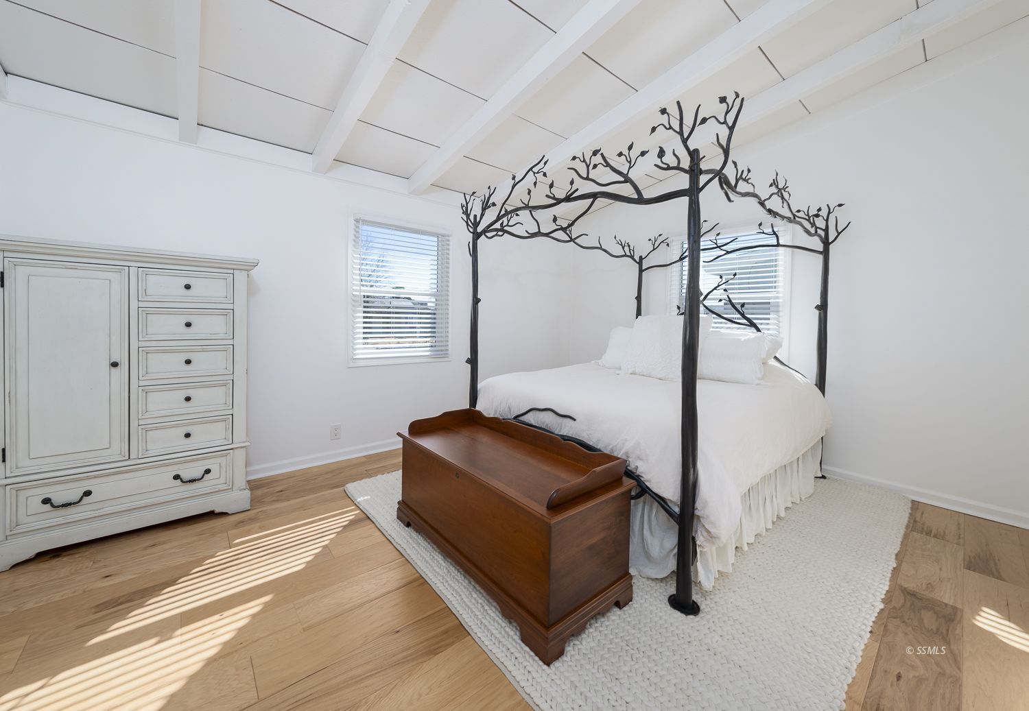 305 North Warner Street Ridgecrest, CA 93555 - Photo 19 of 30 a bedroom with a bed and a dresser
