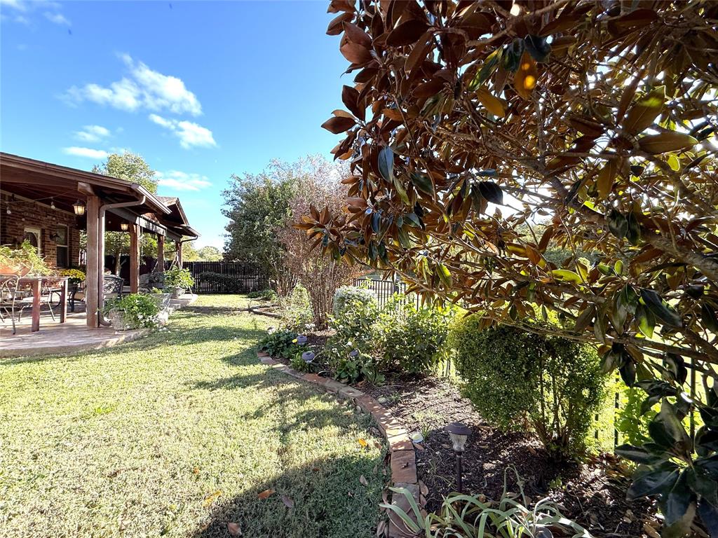 1301 Meadow Ranch Road McKinney, TX 75071 - Photo 33 of 40 Fenced backyard with a patio