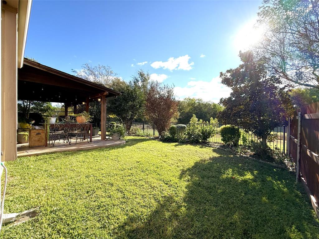 1301 Meadow Ranch Road McKinney, TX 75071 - Photo 34 of 40 Fenced backyard with a patio