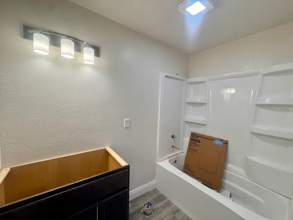 a room with furniture and screen