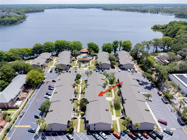 an aerial view of a city and lake view