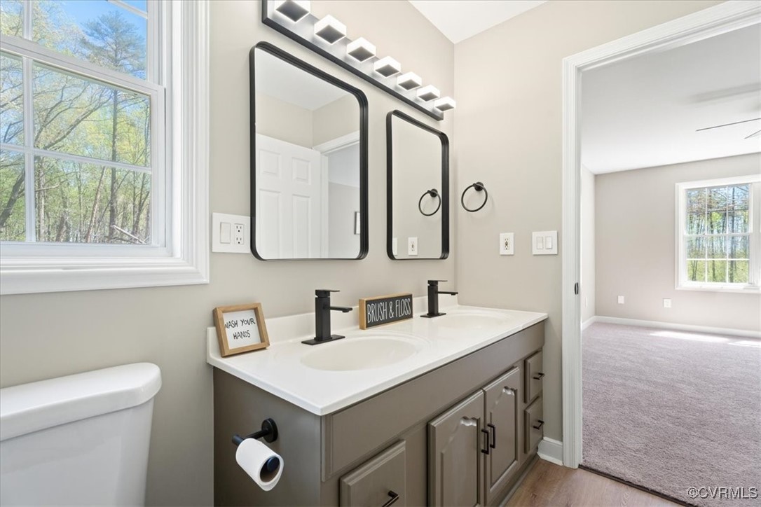 312 Clinton Road Cumberland, VA 23040 - Photo 14 of 29 Primary Bathroom with toilet, double vanity, a sin