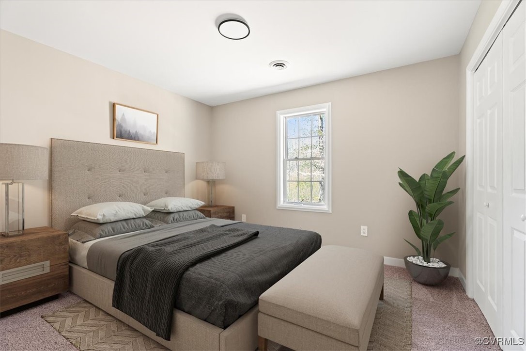 312 Clinton Road Cumberland, VA 23040 - Photo 19 of 29 Bedroom featuring a closet, visible vents, baseboa
