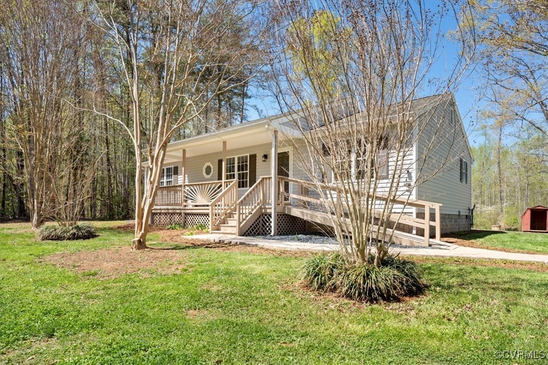 312 Clinton Road Cumberland, VA 23040 - Photo 21 of 29 Single story home featuring a porch and a front la