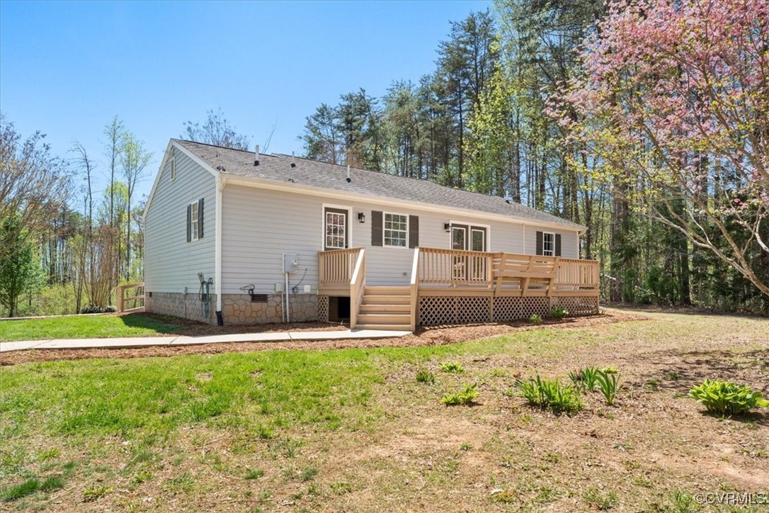 312 Clinton Road Cumberland, VA 23040 - Photo 23 of 29 Back of property with a deck, a lawn, and crawl sp