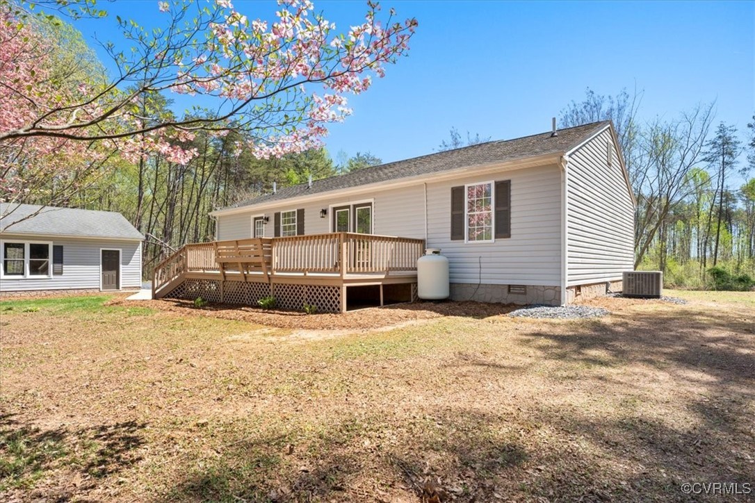 312 Clinton Road Cumberland, VA 23040 - Photo 4 of 29 Rear view of property with central AC, a lawn, a d
