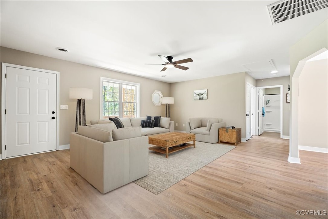 312 Clinton Road Cumberland, VA 23040 - Photo 7 of 29 Living room featuring light wood finished floors,