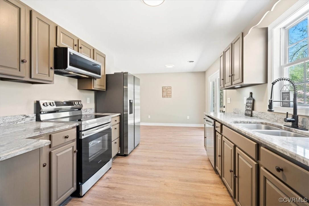 312 Clinton Road Cumberland, VA 23040 - Photo 8 of 29 Kitchen featuring light wood-style flooring, light