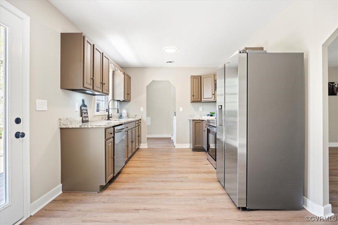 312 Clinton Road Cumberland, VA 23040 - Photo 10 of 29 Kitchen with light wood finished floors, a sink, b