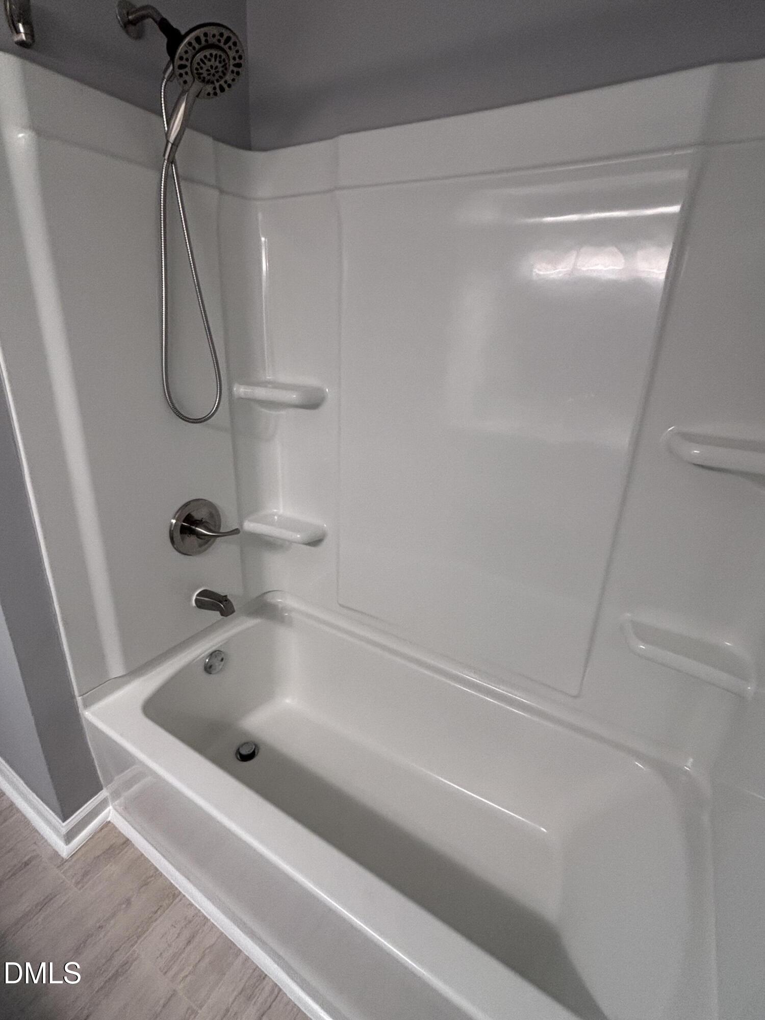 504 St Andrews Church Road Sanford, NC 27332 - Photo 11 of 22 a bathroom with a bath tub with a shower
