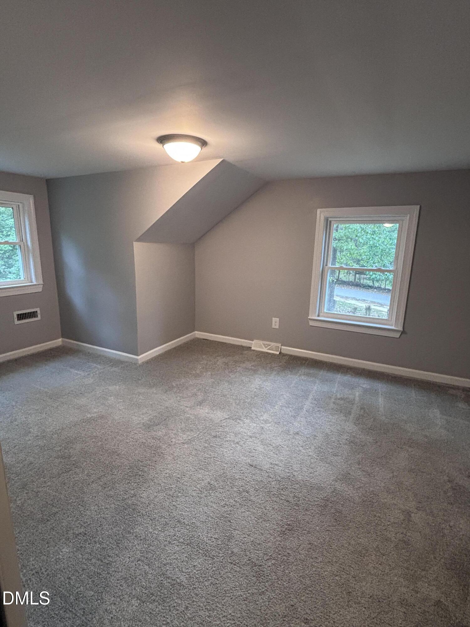 504 St Andrews Church Road Sanford, NC 27332 - Photo 15 of 22 an empty room with windows