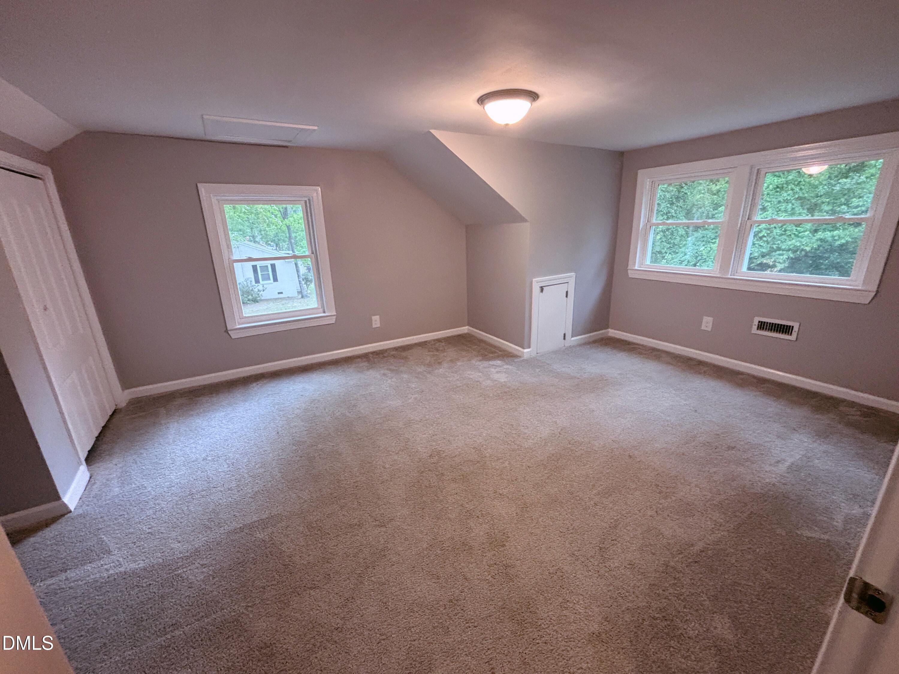 504 St Andrews Church Road Sanford, NC 27332 - Photo 16 of 22 an empty room with windows and closet
