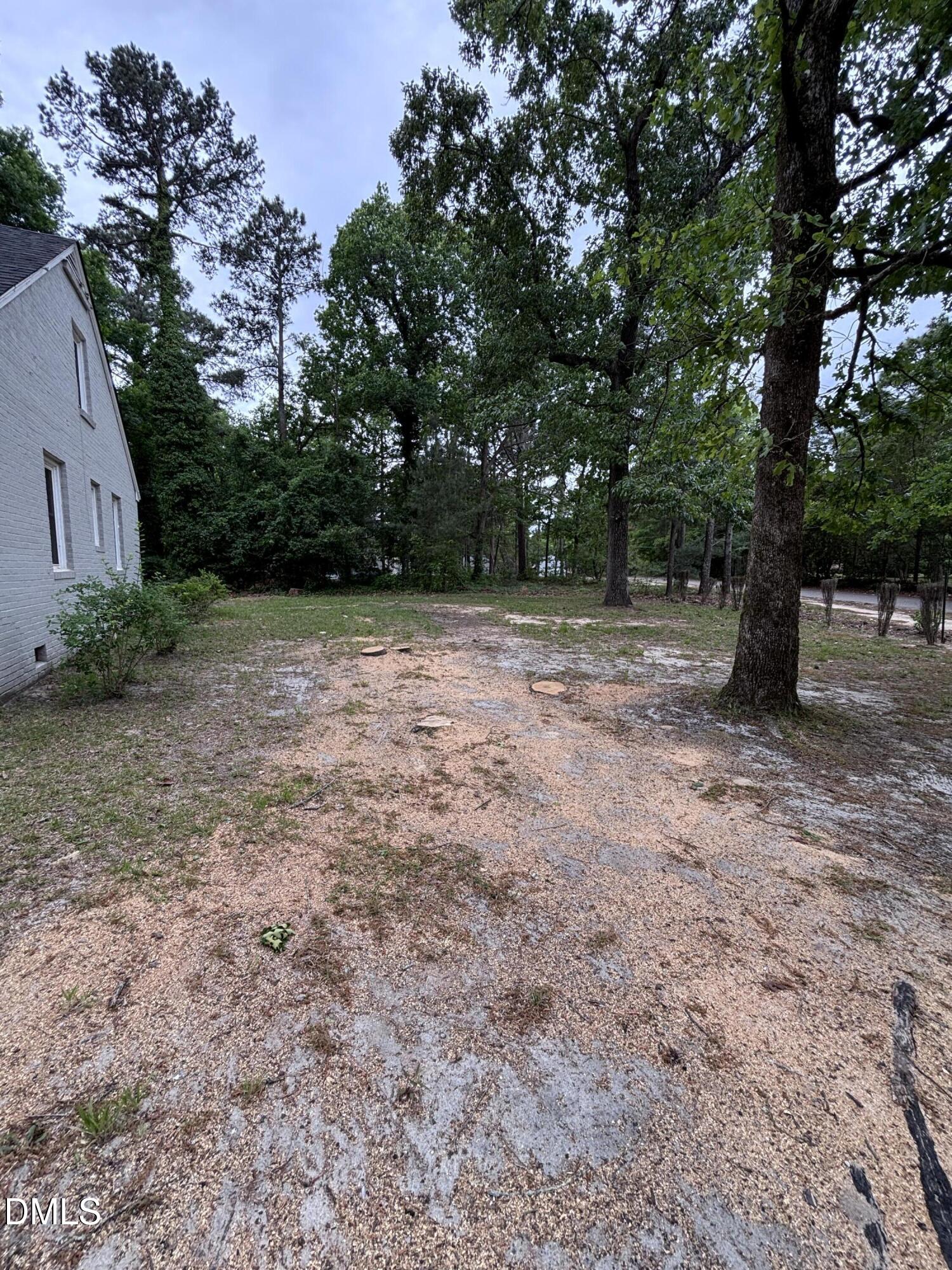 504 St Andrews Church Road Sanford, NC 27332 - Photo 21 of 22 a view of a yard with a tree