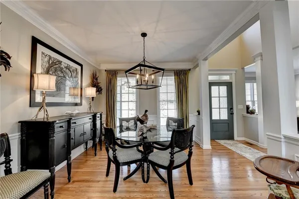 a living room with furniture flat screen tv and a fireplace