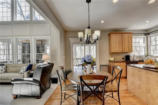 a view of a dining room with furniture window and outside view