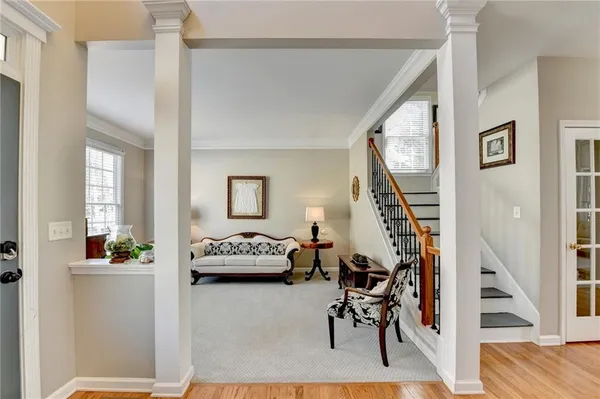 a dining room with furniture window wooden floor