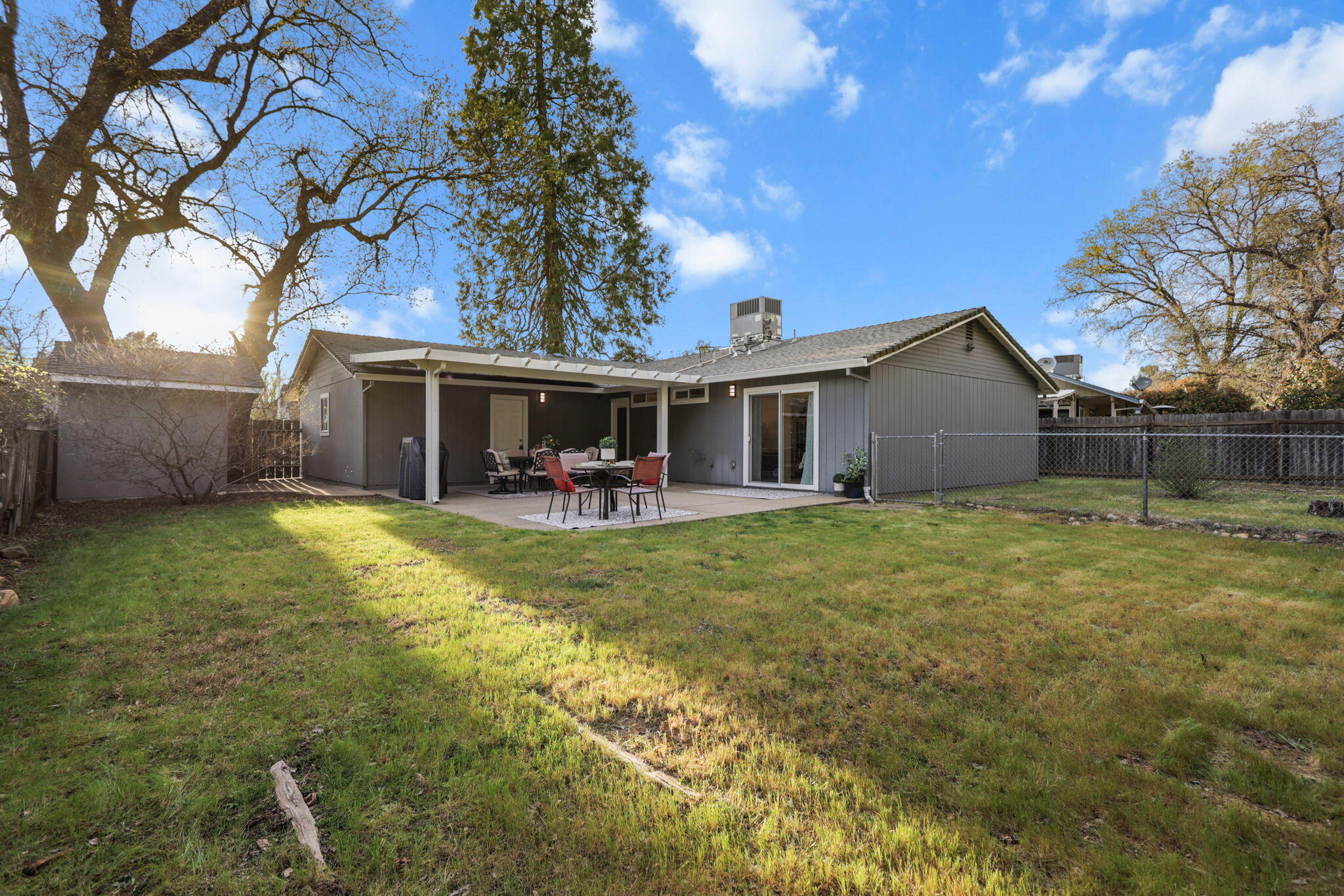 61 Tidmore Lane Redding, CA 96003 - Photo 31 of 38 front view of a house with a yard