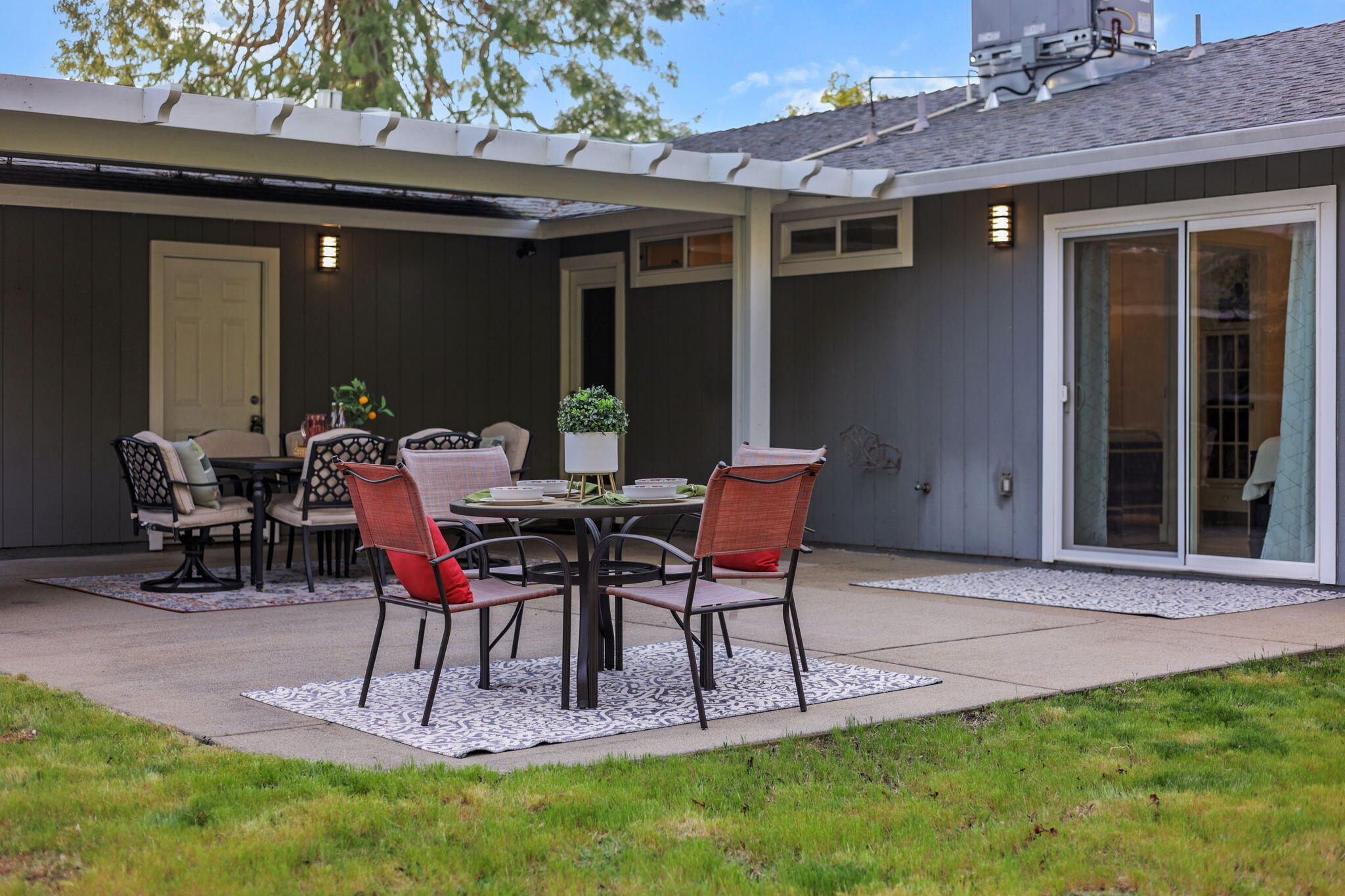 61 Tidmore Lane Redding, CA 96003 - Photo 33 of 38 a view of a patio with table and chairs