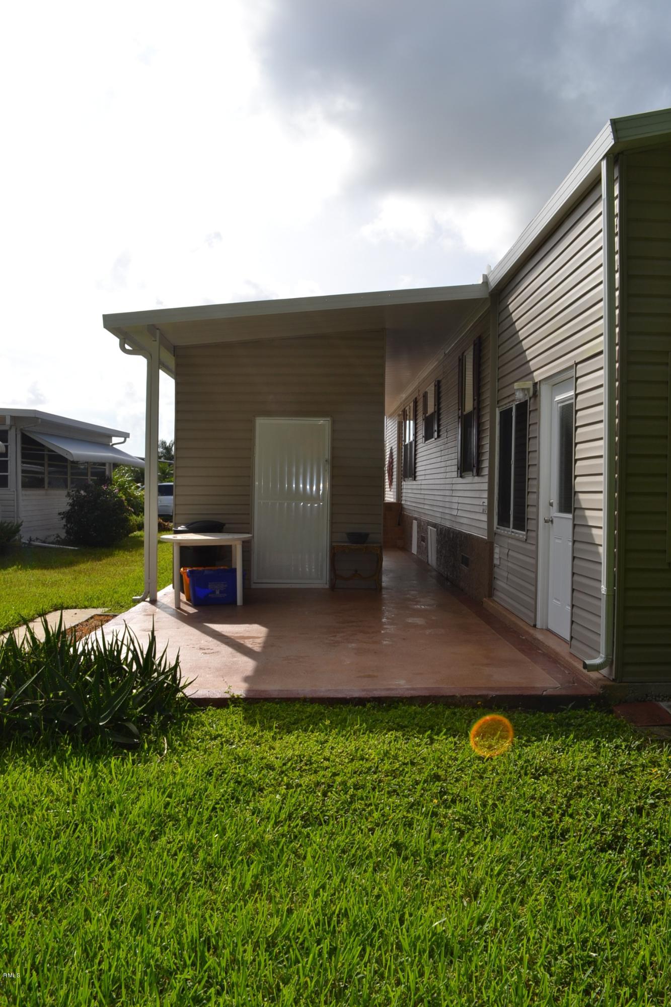 8413 East Club Road Boca Raton, FL 33433 - Photo 5 of 29 Open patio and storage shed